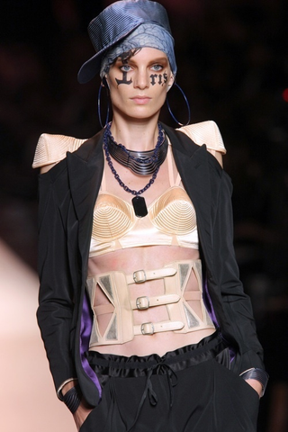 Illustration for article titled Jean-Paul Gaultier: Brights, Bras, Bellies, And Braids